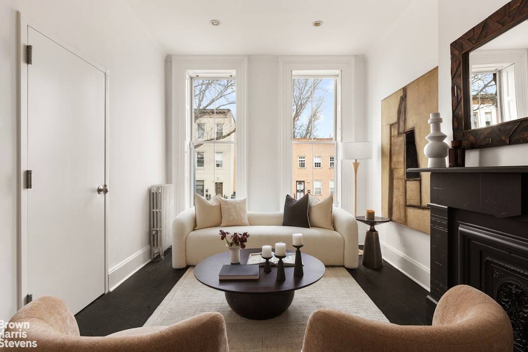 Bold design meets classic Brooklyn character in this striking Stuyvesant Heights townhouse offering spanning two thoughtfully designed units.