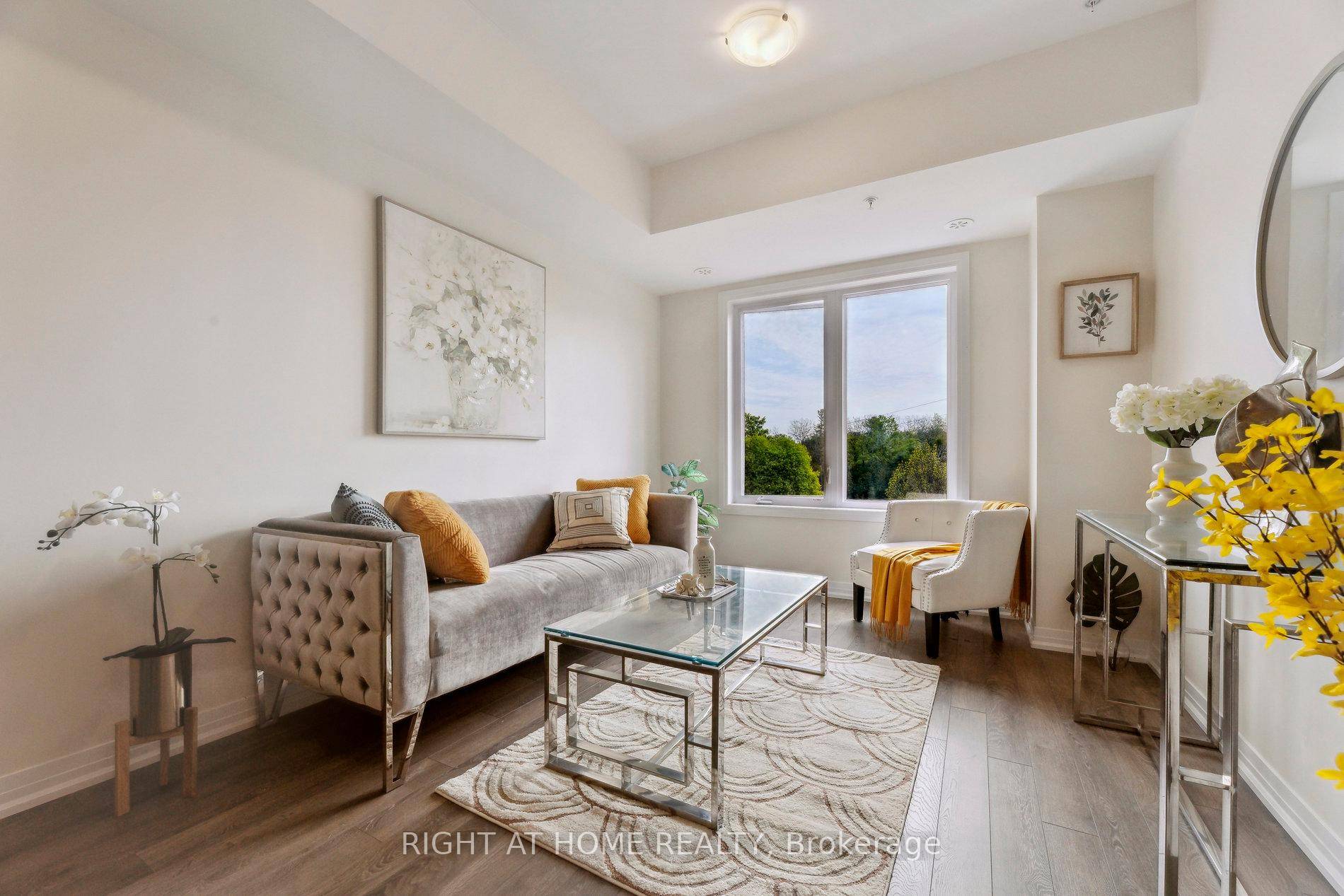 RARELY OFFERED UNIT Welcome to this almost new spacious 3 bed 3 washroom townhome with a beautiful view over looking a Ravine pond lush forest of Pickering Golf Club.
