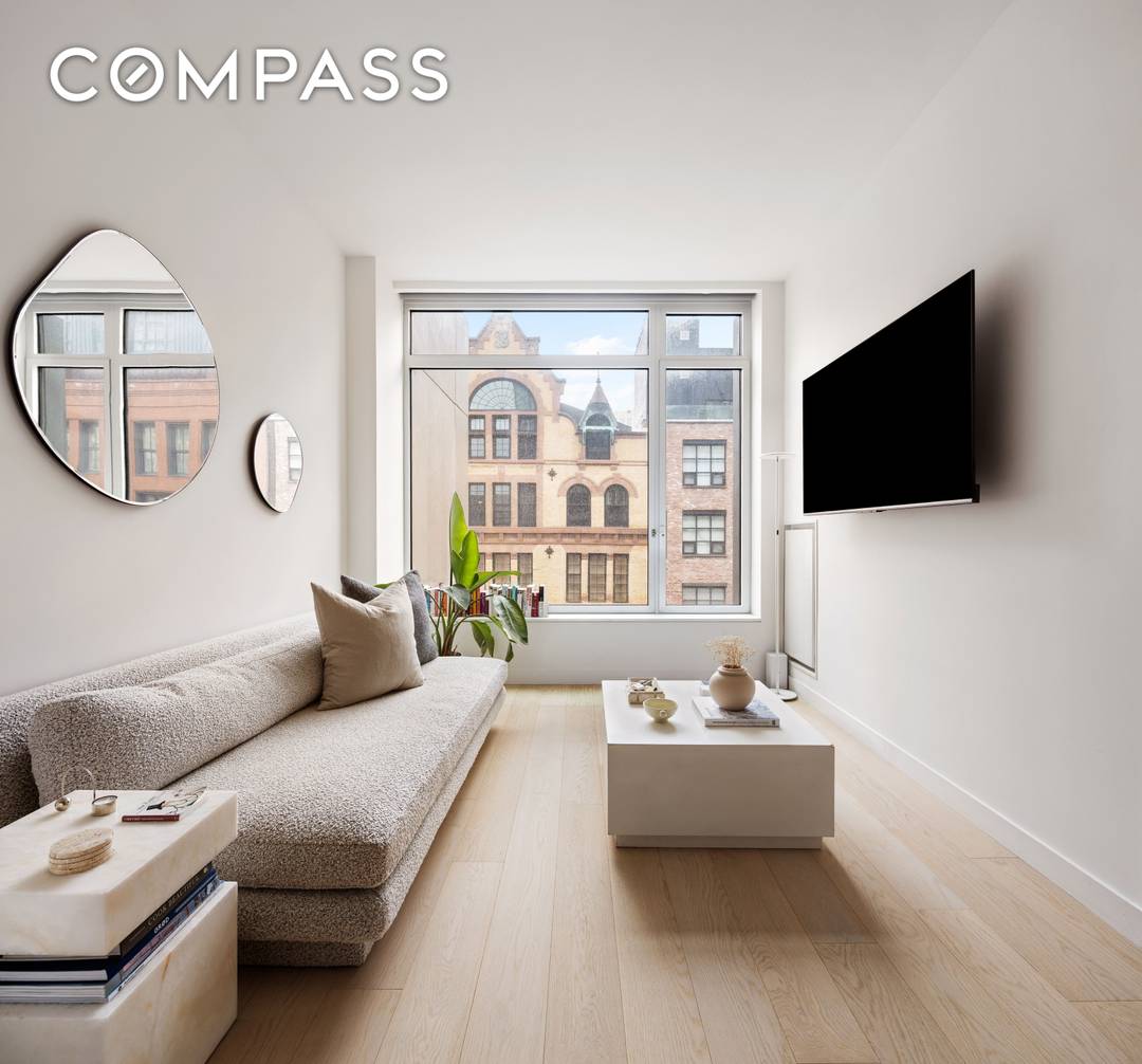 Residence 617 at 450 Washington Street is a sun filled one bedroom home featuring customized California Closet build outs in both primary bedroom closets, automatic blinds, and blackout shades in ...