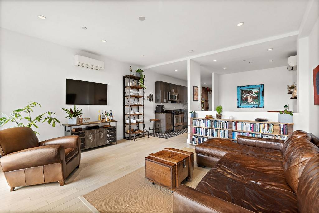 At over 1, 000 square feet, this spacious and sun filled one bedroom, two bathroom apartment can be easily converted into a two bedroom home.