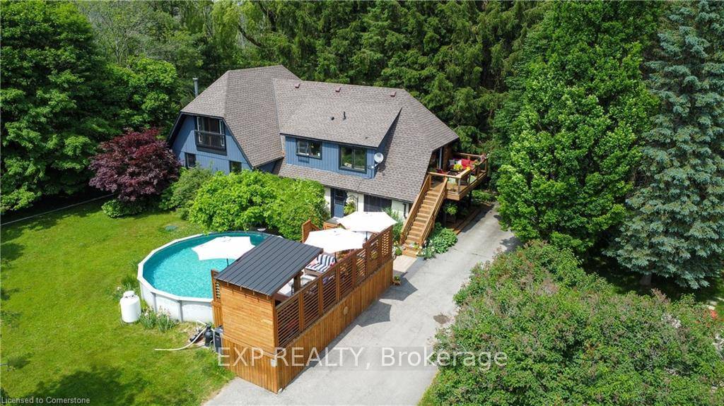 Discover unparalleled privacy on this remarkable 8 acre estate, where nature and lifestyle blend seamlessly.