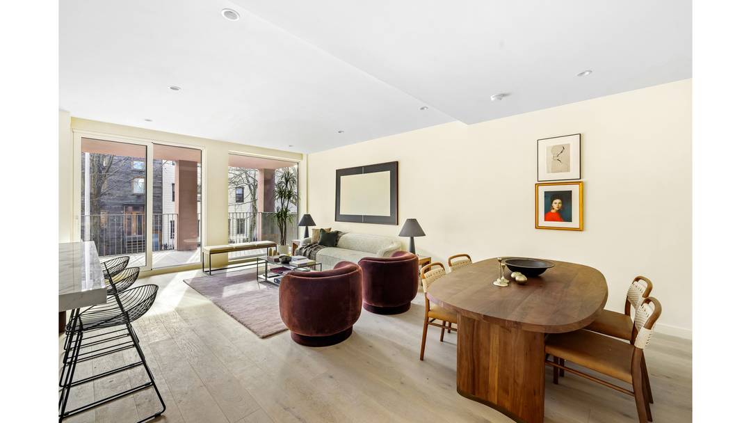 109 Devoe Street is a modern residential building distinguished by its striking architecture, elongated proportions, and an intentional emphasis on light and openness.