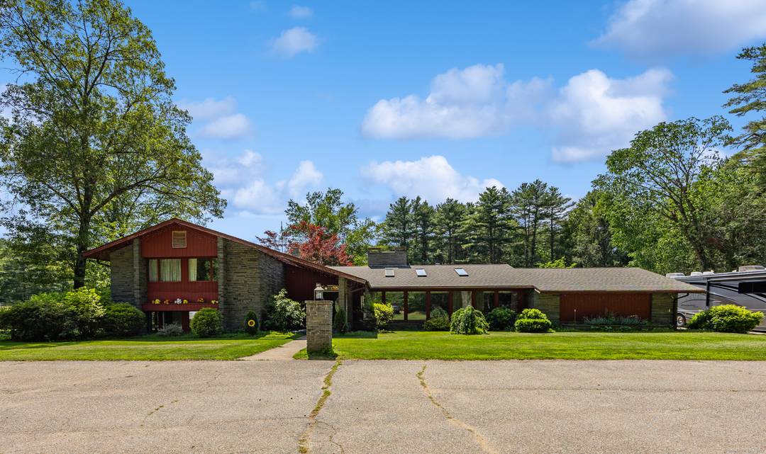 Discover the perfect blend of contemporary living and expansive rural charm in this stunning 6 bedroom, 3.