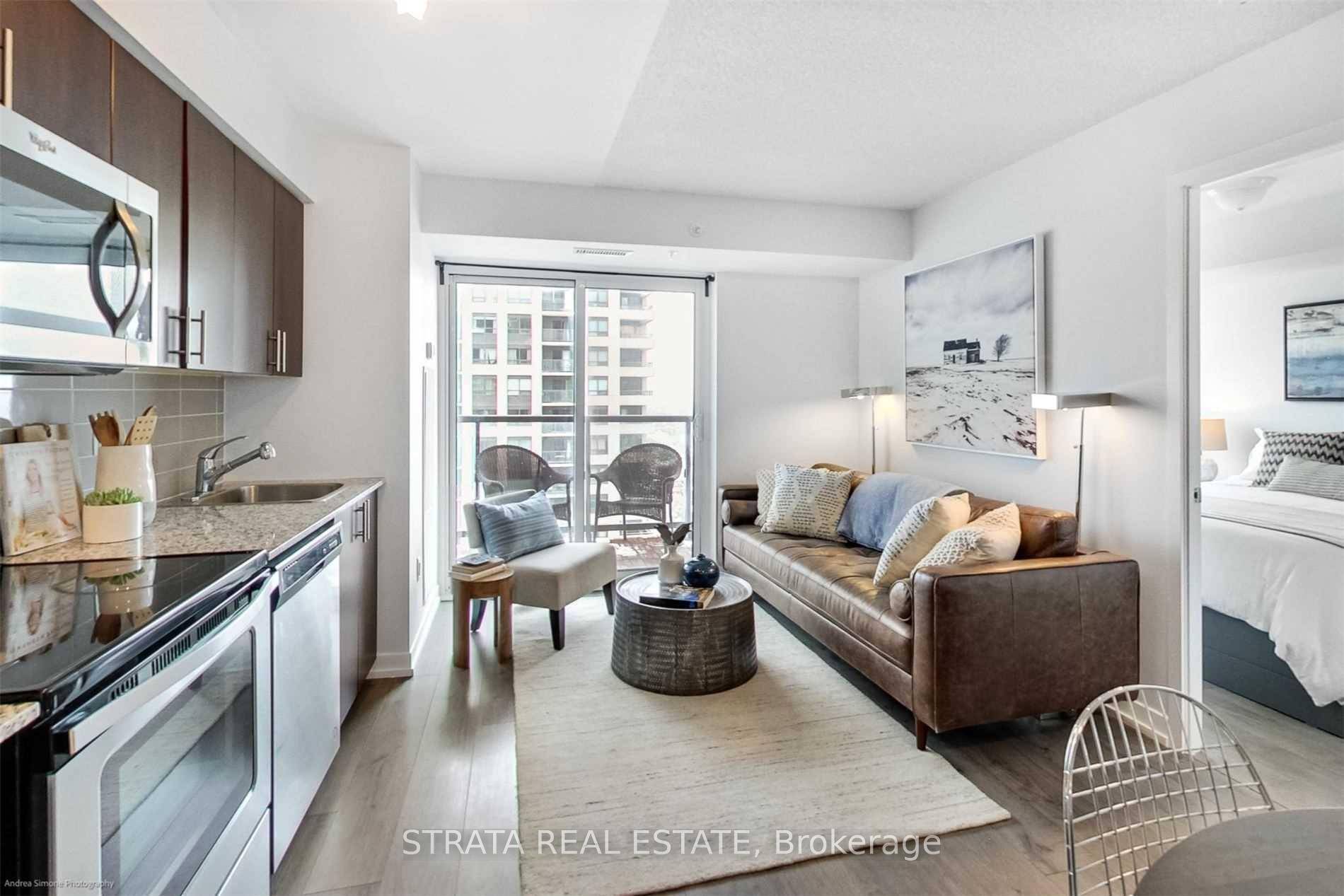 Bright and spacious 1 bedroom condo with open concept kitchen and living room.