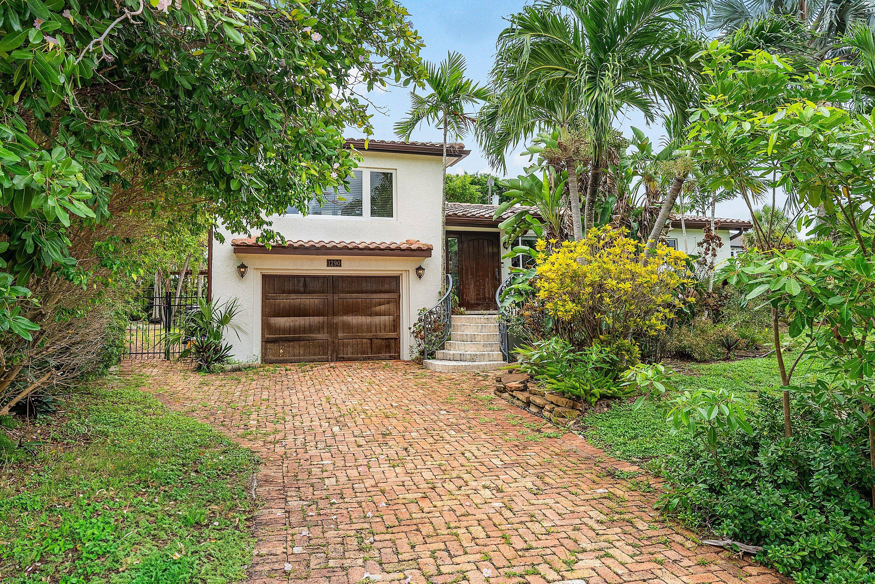 Move right in, renovate or build on this 8800 square foot lot in the ever popular Golden Triangle, in East Boca Raton.