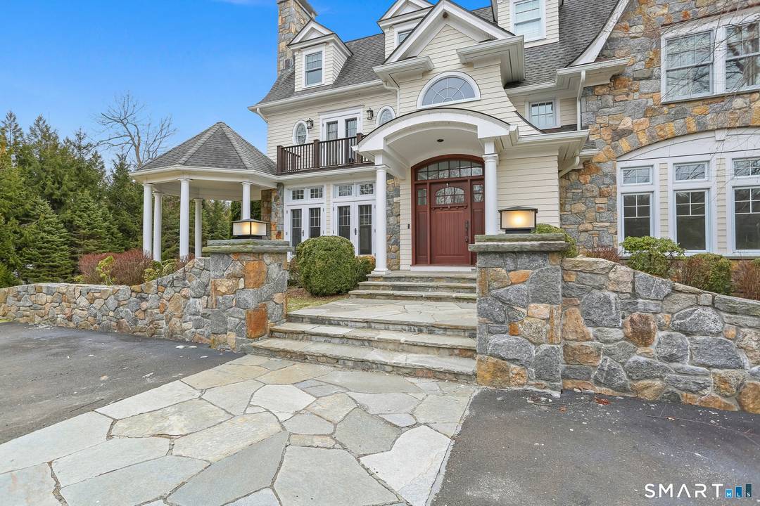 Located in the desirable Lake Wind Ponus Ridge corridor, this custom Colonial estate offers over 9, 000 square feet of living space, thoughtfully rebuilt in 2010 and designed for both ...