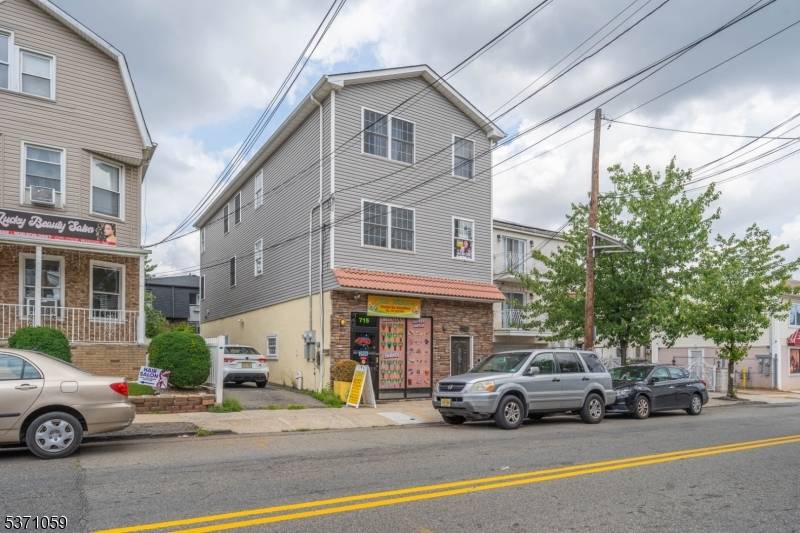 Fully renovated mixed use property in the heart of Elizabeth featuring a leased commercial space on the first floor and a spacious multi level residential unit above, offering 5 bedrooms ...