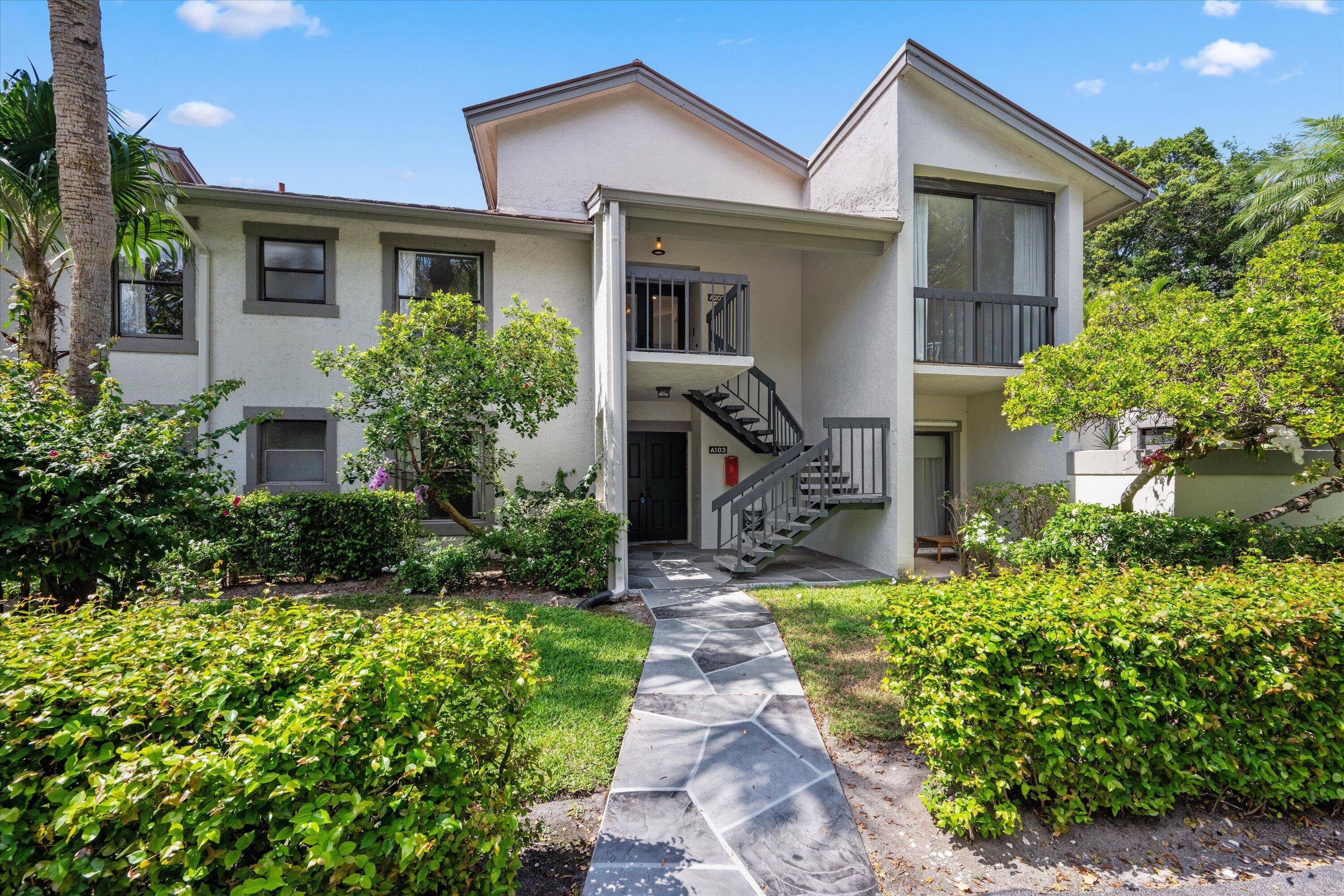 Welcome to Residence A203 at the prestigious Palm Beach Polo Country Club a fully renovated, 2, 000 plus square foot golf cottage that blends modern elegance with the warmth of ...
