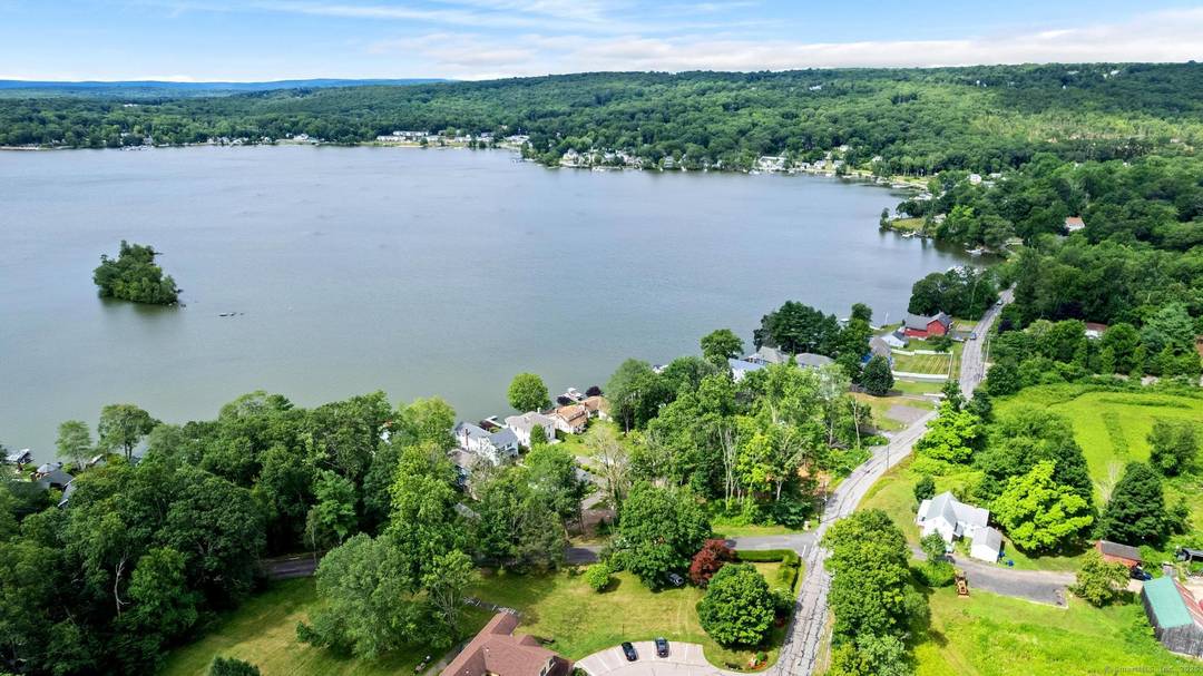 Welcome to your dream retreat in East Hampton this beautifully built, never lived in home offers the perfect blend of modern luxury and serene lake living.