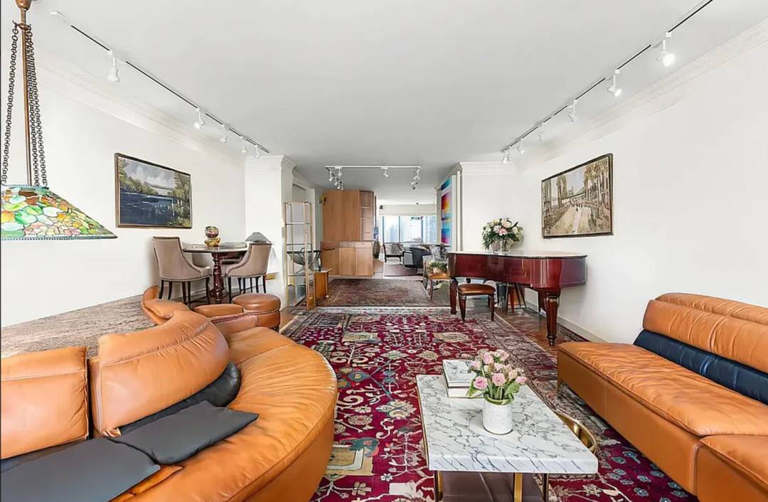 Set high within one of East End Avenue's most distinguished cooperatives, Residence 27B offers breathtaking views of the East River and city skyline through expansive windows that flood the home ...