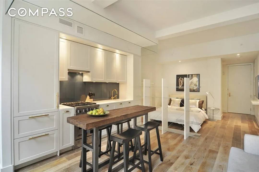 Welcome to your new modern perch in the heart of Tribeca at 93 Worth Street, Unit 405.