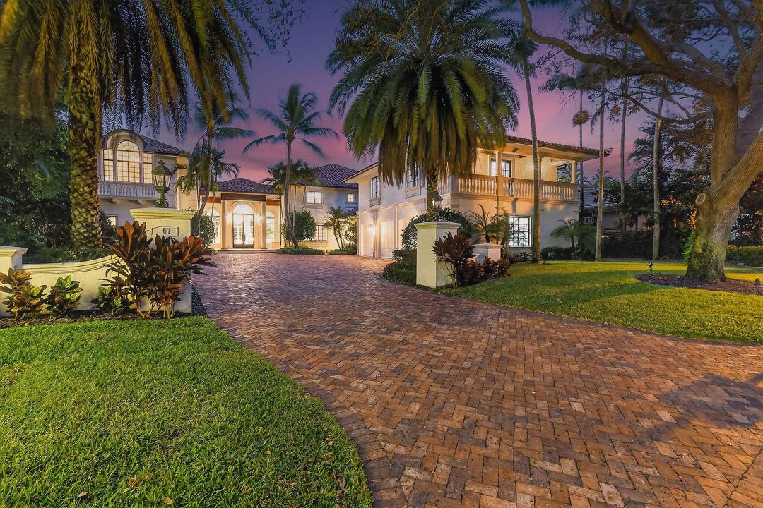 Set on a coveted cul de sac in the heart of Admirals Cove, 107 Schooner Lane is a rare waterfront and golf course estate offering extraordinary scale, privacy, and craftsmanship.