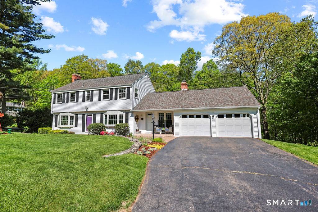 From the moment you arrive, the professionally landscaped grounds set the tone lush, manicured, and unmistakably cared for.