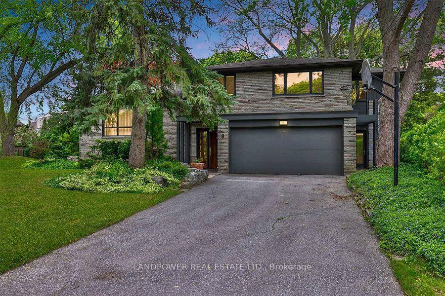 Architecturally significant family residence nestled at the end of a cul de sac on a gorgeous pie shaped lot abutting the park.