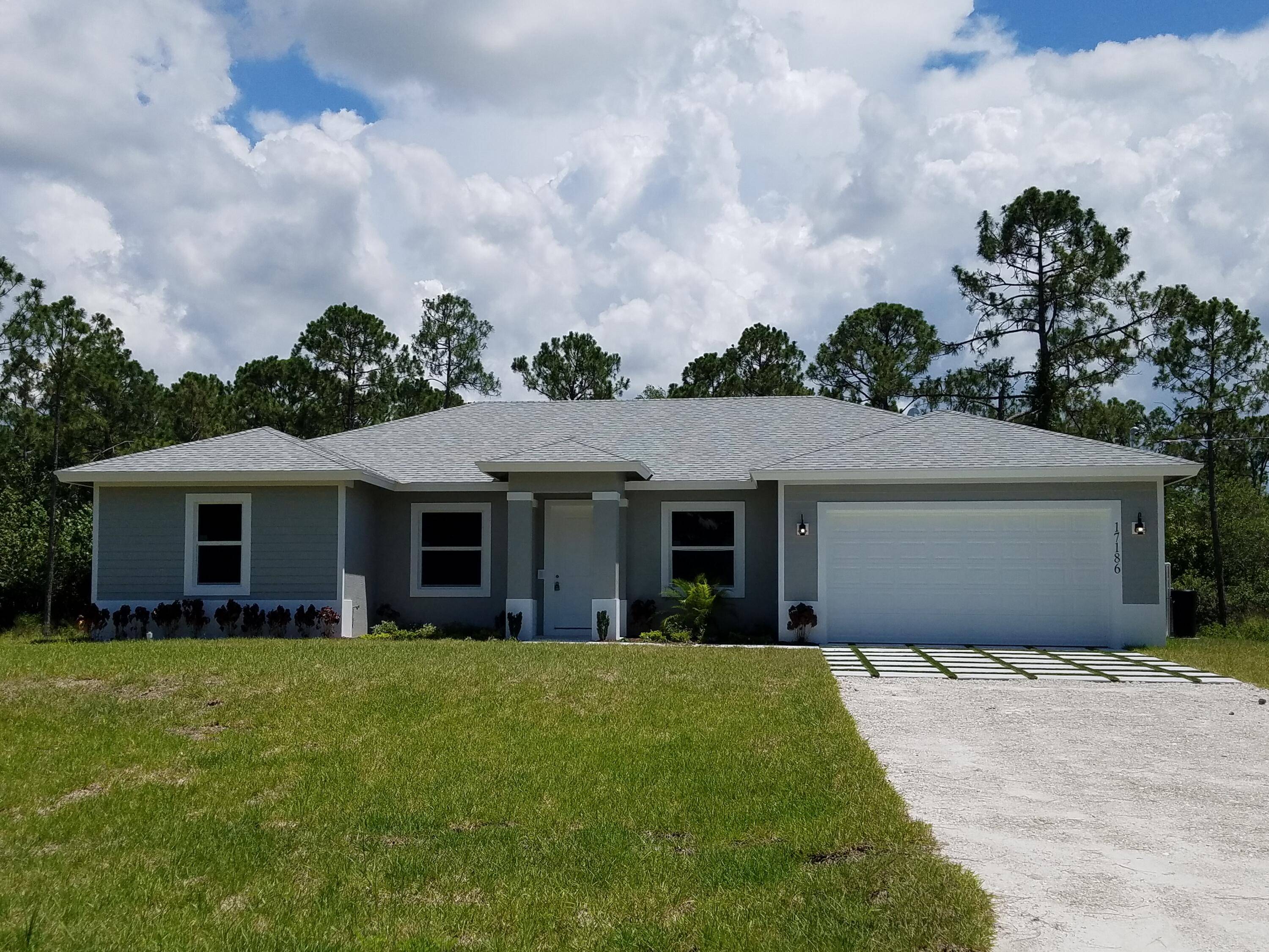BEAUTIFUL 4 BEDROOM HOME FEATURING A SPLIT LAYOUT WITH AN OPEN LIVING CONCEPT GREAT FOR ENTERTAINING !