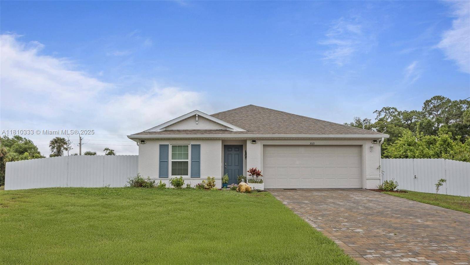 Welcome to 3021 June Circle, a beautifully crafted single family home in the serene Port LaBelle community.