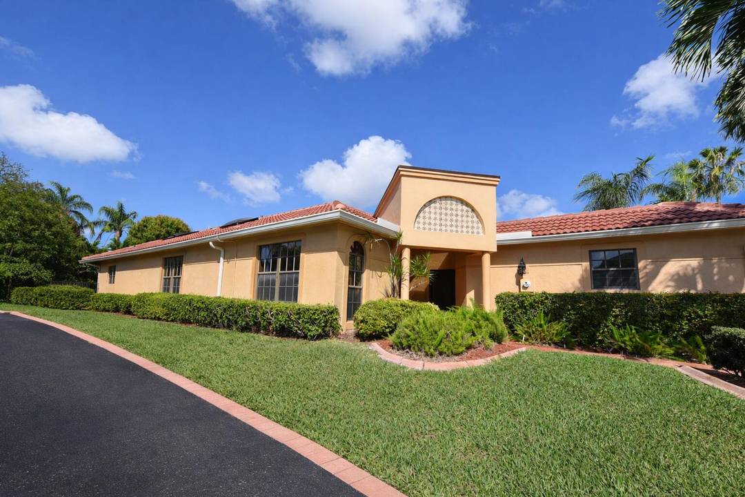 Dream corner home in Boca Raton located in a desirable gated community !