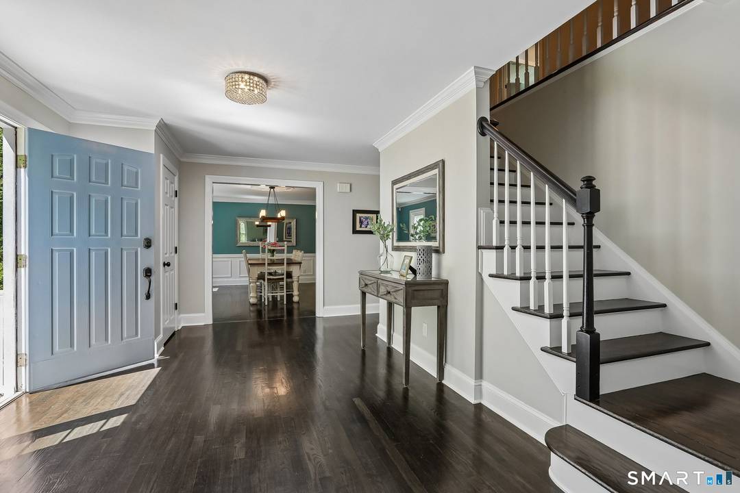 Nestled in a prime location in Ridgefield, this exceptional four bedroom Colonial offers the perfect blend of space, functionality, and timeless design.