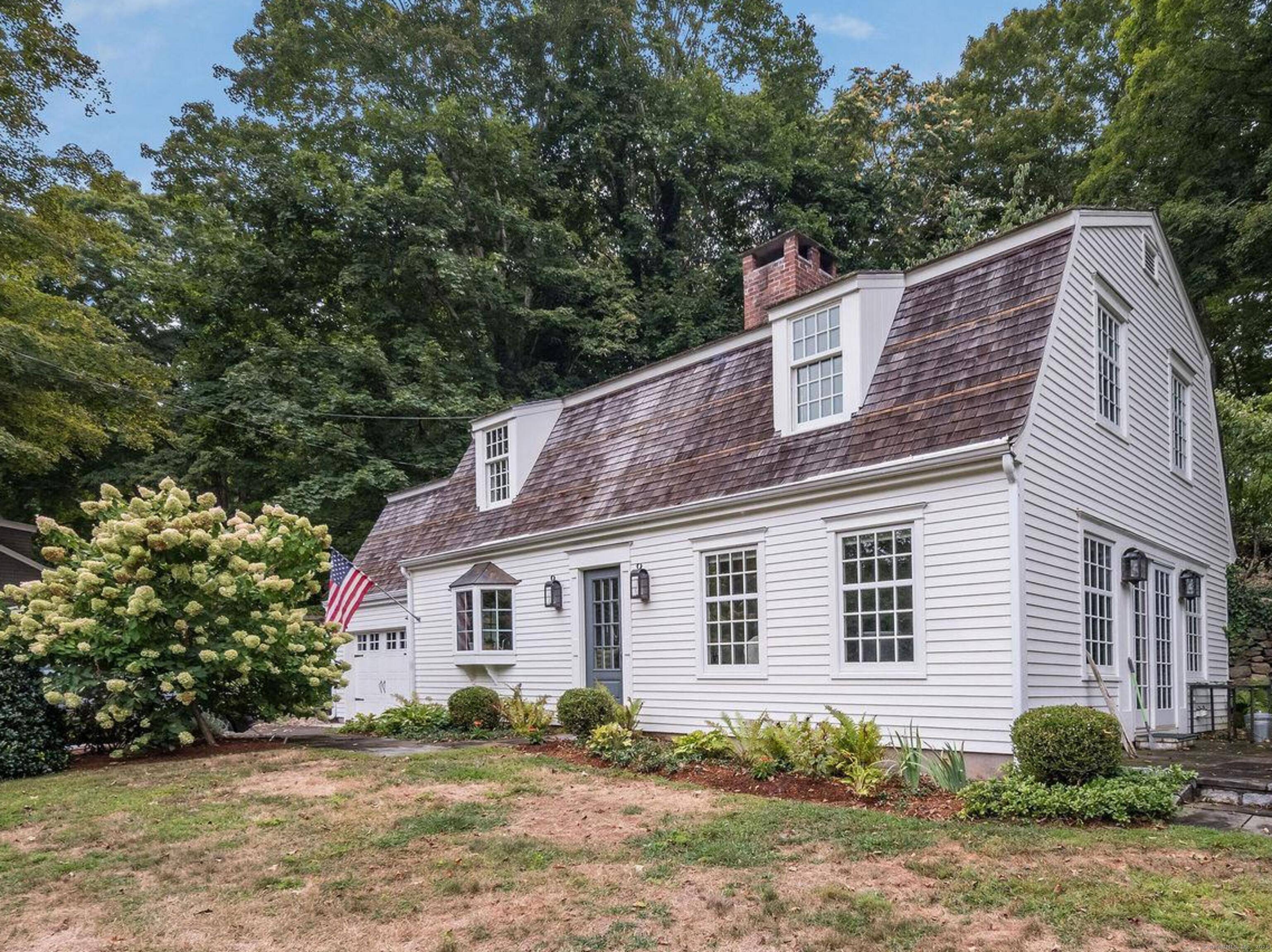 Absolutely Delightful ! Tucked away in the heart of Essex Village you'll find 38 Grove Street, a classical New England styled Antique Colonial.