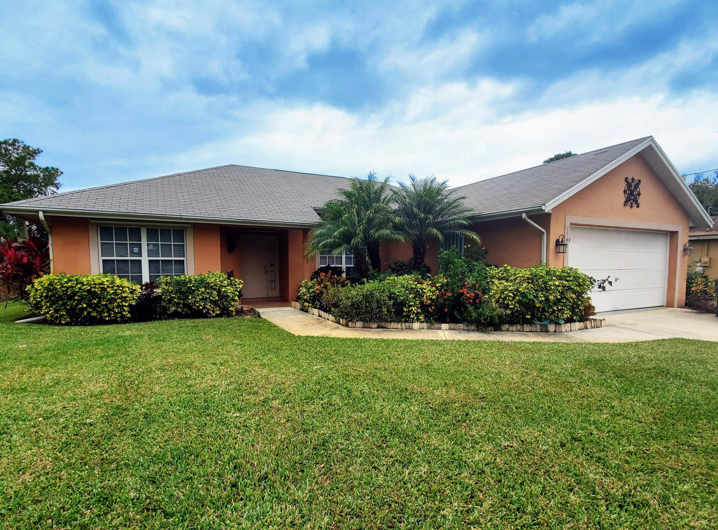 This charming 3 bedroom, 2 bath, 2 car garage CBS block home offers a perfect blend of comfort, style, and location.
