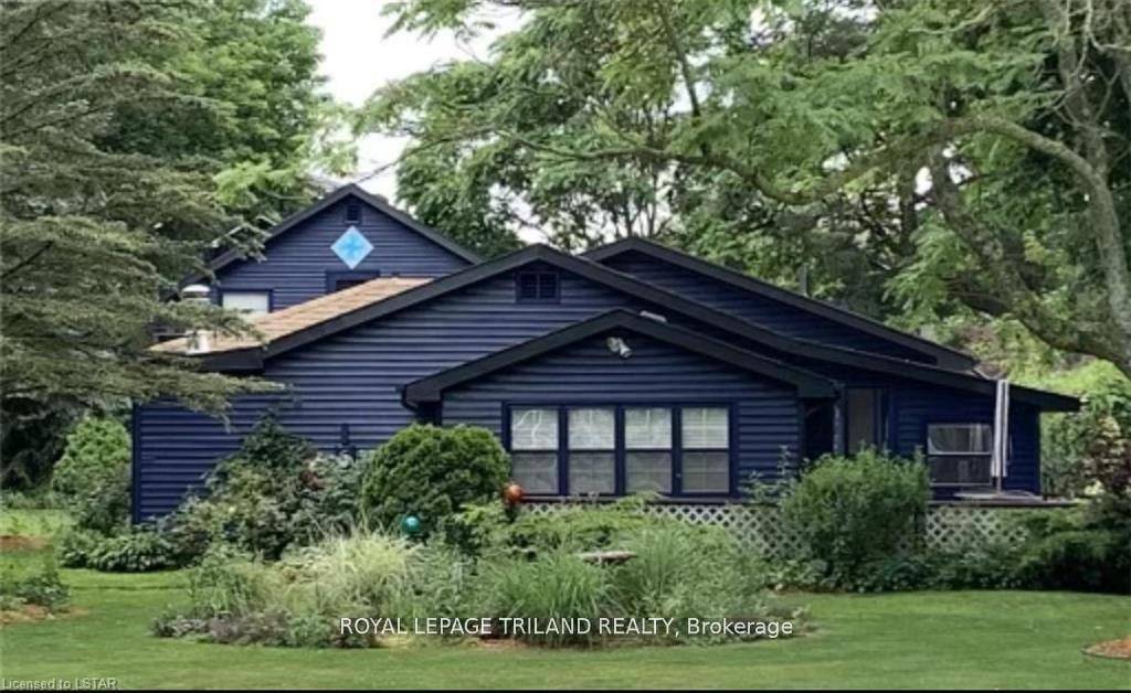 Beautiful year round home with lake views, across from the Port Franks marina, with large detached legal guest house in the back.
