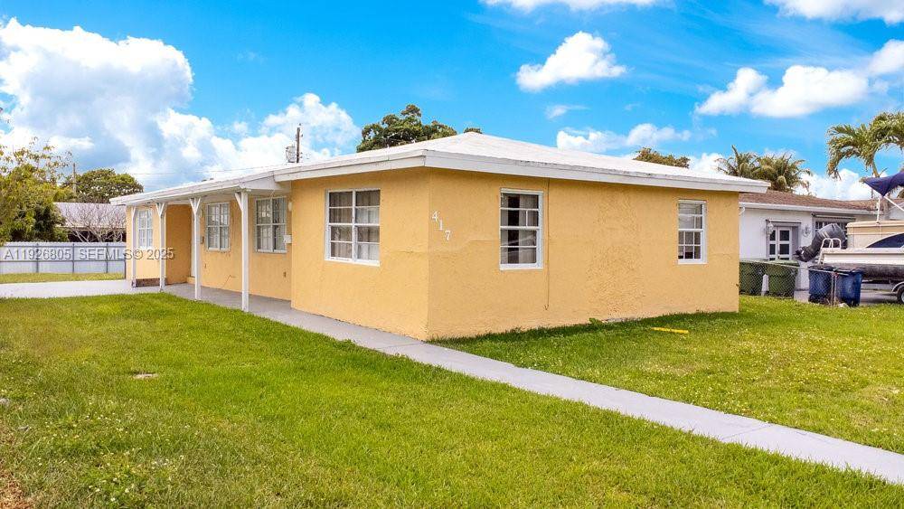 This partially remodeled duplex features two vacant units, each configured with two bedrooms and one bathroom.