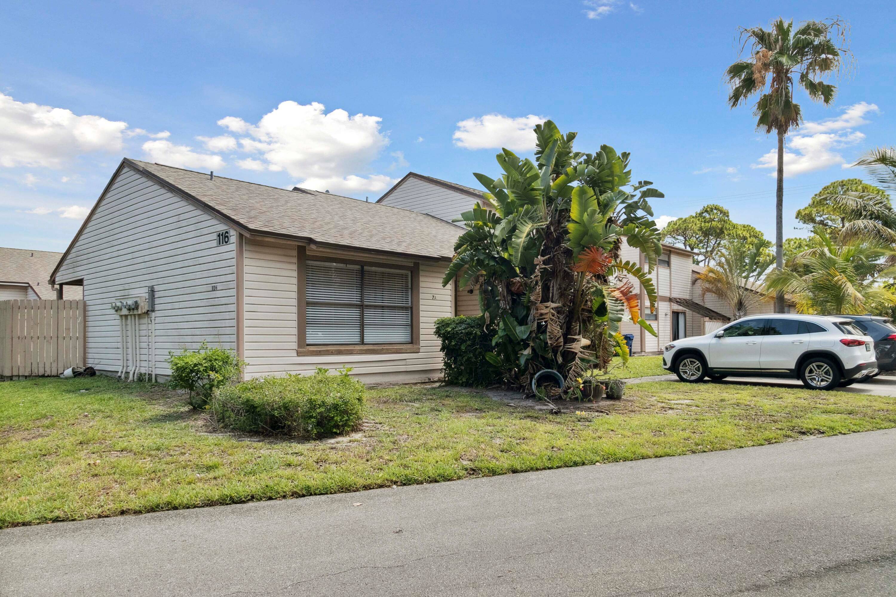 Immaculate single story corner villa featuring two bedrooms and a private corner yard.