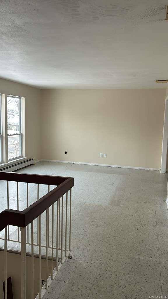 Beautifully maintained 3 bedroom, 2 full bathroom home featuring a formal dining room and a large eat in kitchen with marble flooring.