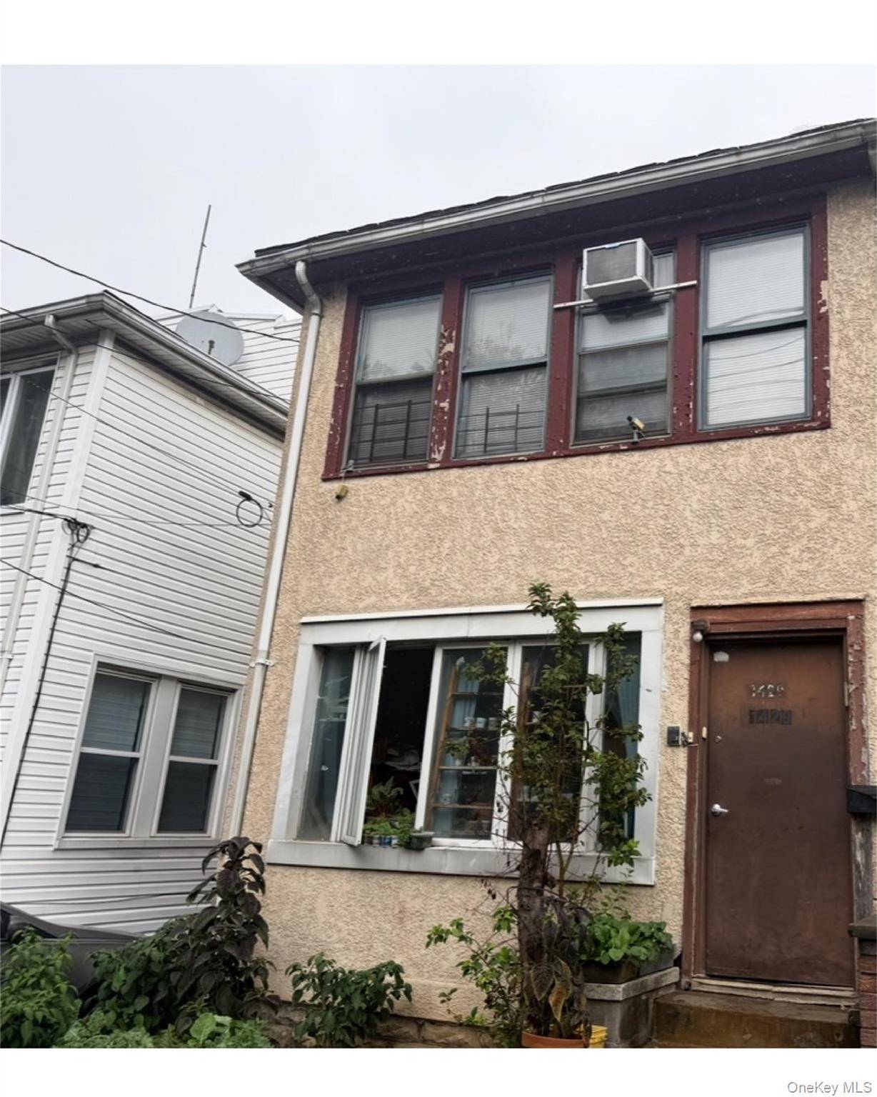 Legal 2 family home in the Midwood section close to all.