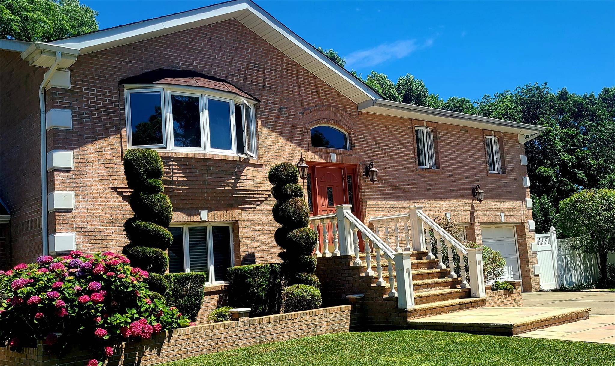 A must see. Magnificent, contemporary all brick home on a quiet cul de sac in pristine condition.