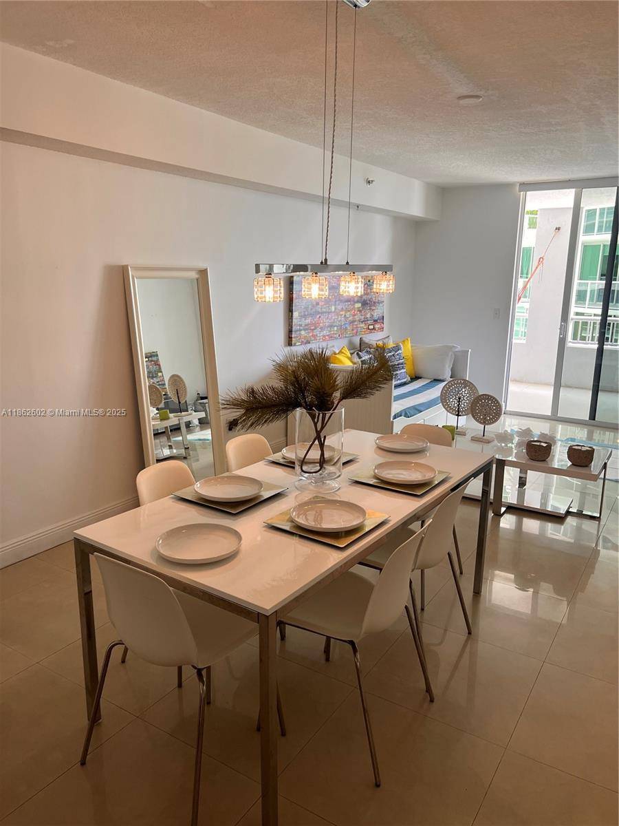 Experience modern urban living in this bright and spacious 2 bedroom, 2 bath residence featuring an open concept layout, abundant natural light, and a large balcony with breathtaking views of ...