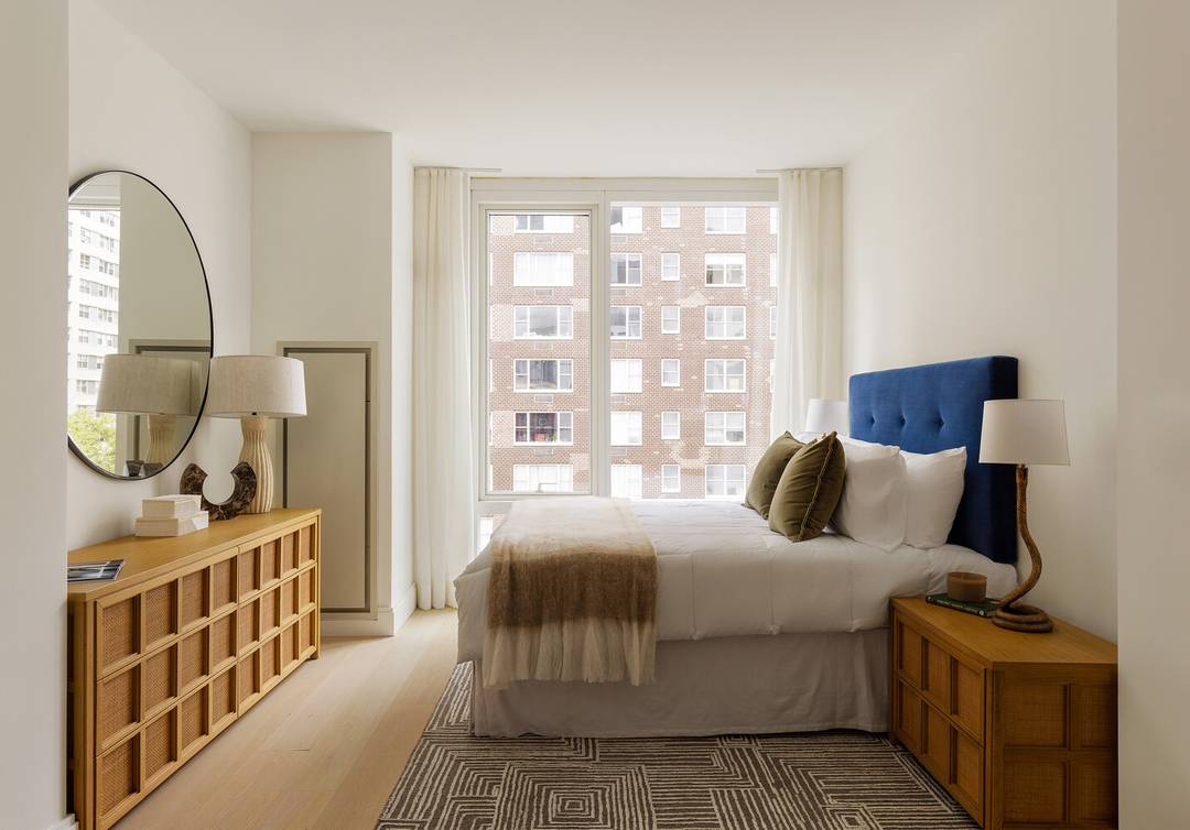 Luxury Alcove Studio Home with 10' floor to ceiling windows and an ideal layout !