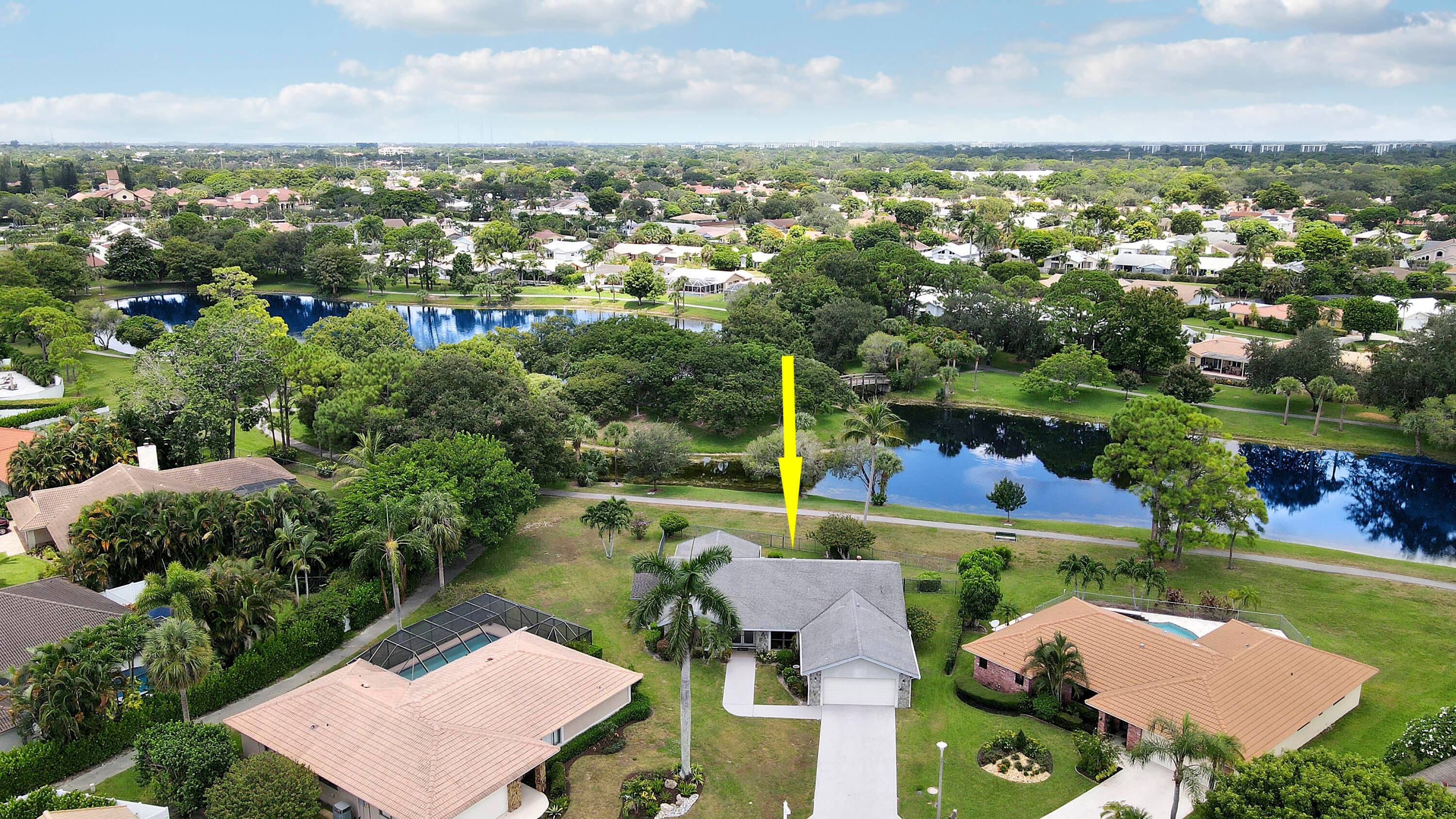 Lakefront pool home featuring 4 bedrooms, 2.