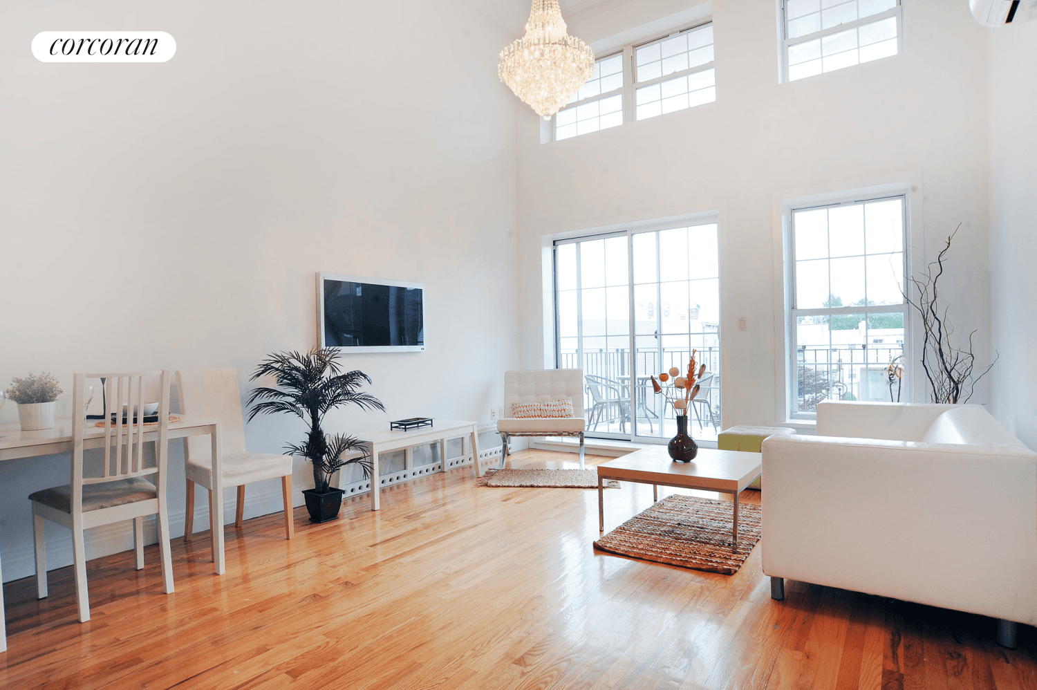 Incredible south facing loft like duplex with private outdoor space.