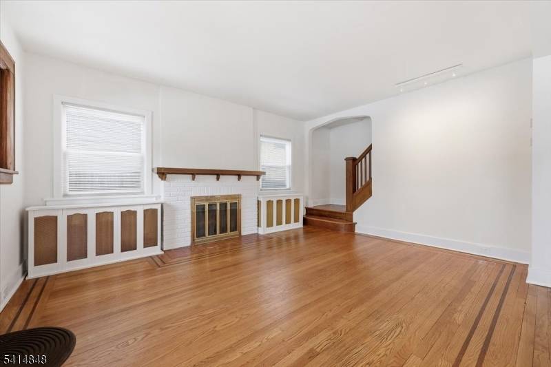 Welcome to this newly renovated, sun filled 3 bedroom, 3 bath home with windows on three sides, filling the home with natural light.