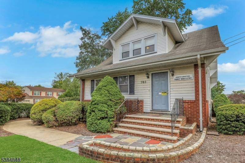 Step into a rare find, a versatile commercial building uniquely situated within a residential neighborhood, offering a blend of convenience, visibility, and endless potential.