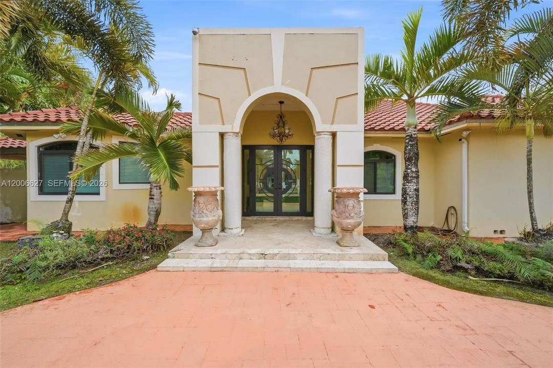Set within the prestigious Hialeah Gardens Estates, a rarely available community known for its space and appeal, this Mediterranean inspired South Florida ranch offers a unique blend of comfort and ...