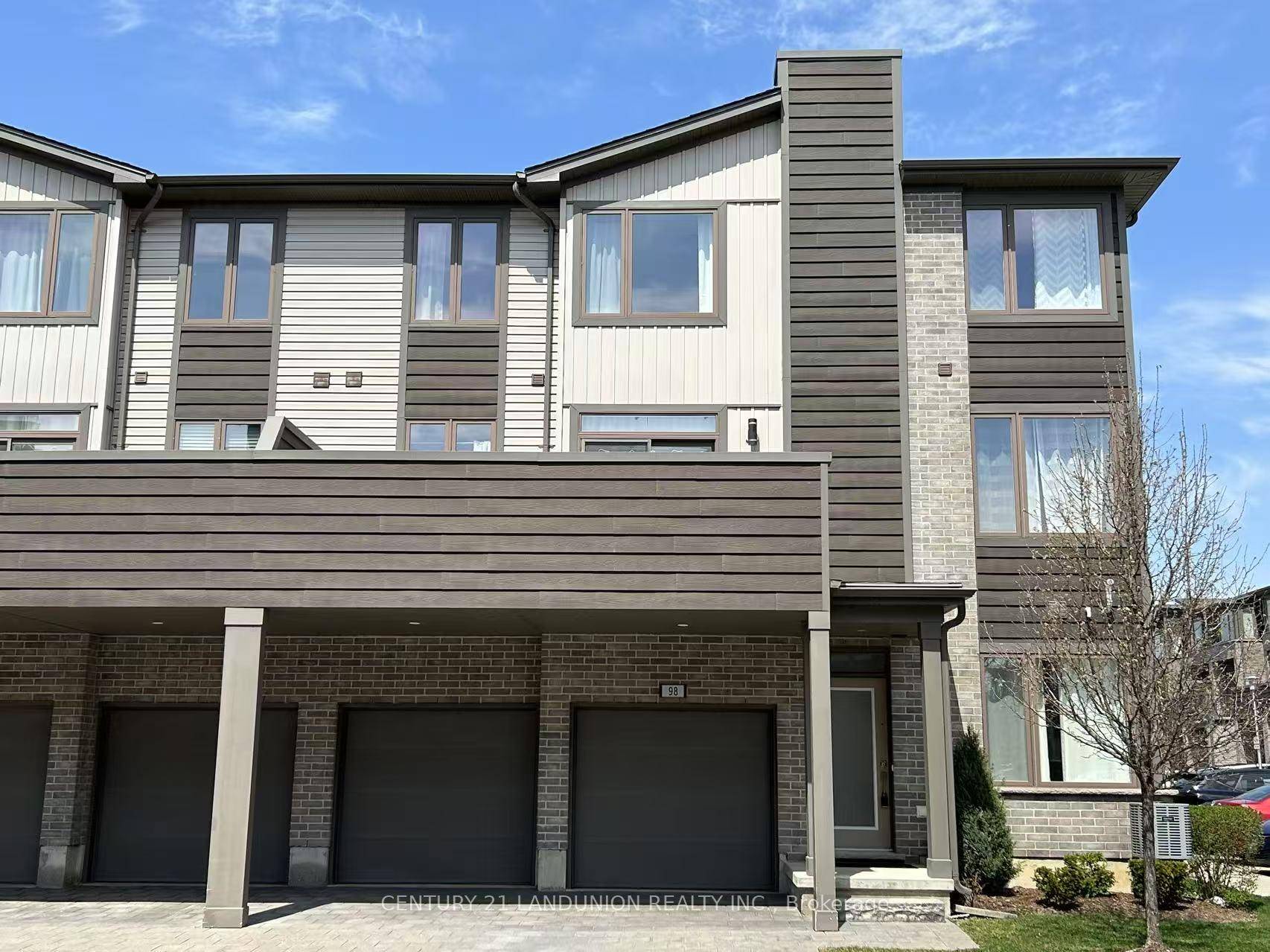 Rare double garage end unit townhouse condo offering 1802 sqft of modern, thoughtfully designed living space in Londons sought after Hyde Park community.