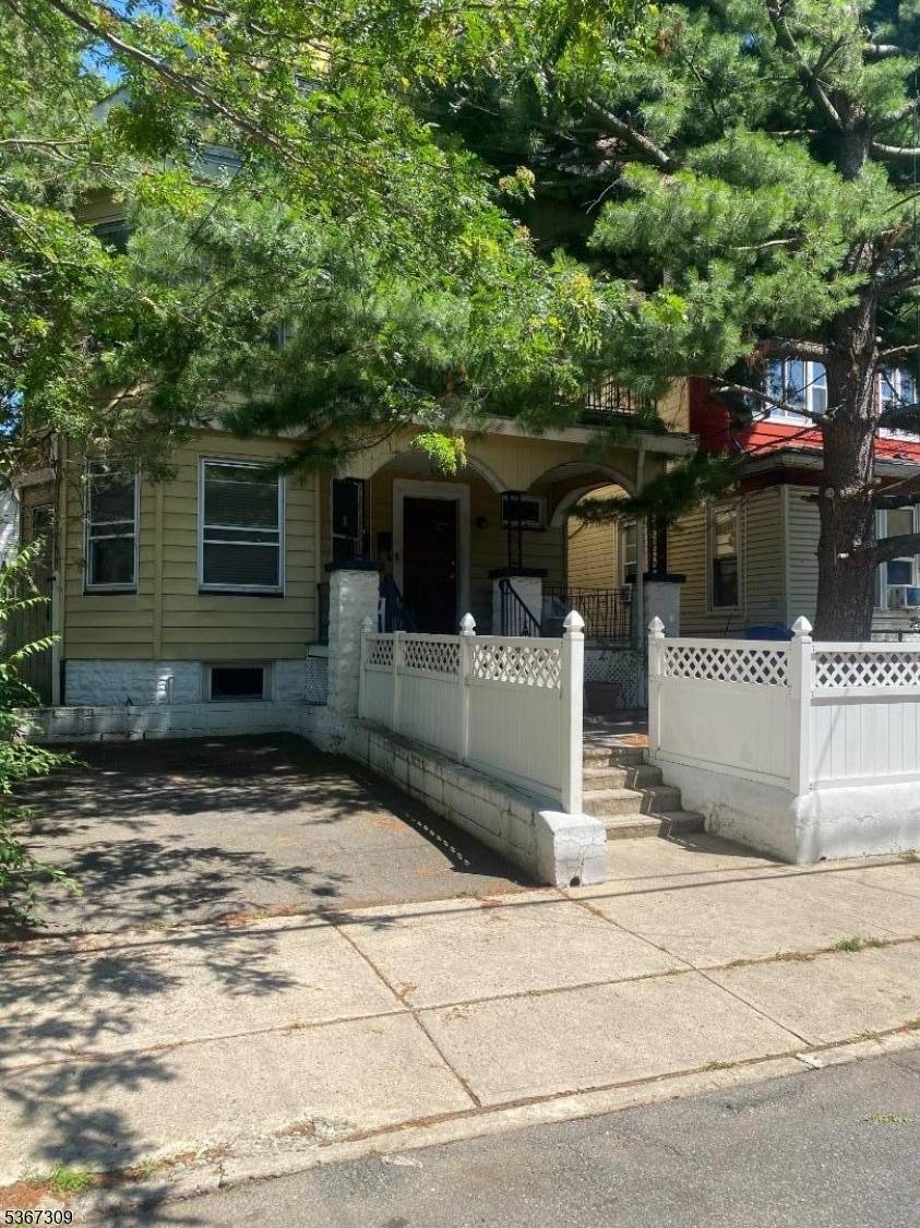 Two family house with two separate 3 bedrm 1 bath apartments.