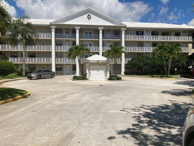 CONVENIENT 1ST FLOOR GARDEN UNIT THAT OFFERS LOADS OF UPGRADES IN THIS 2 BEDROOM 2 BATH CONDO WITH MIRRORED FOYER, EAT IN KITCHEN, NEWER COUNTERS WITH BREAKFAST BAR, HUGH CARPETED ...