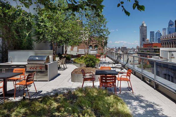 Spacious one bedroom featuring a flexible layout with space for a dedicate dining or home office nook, gourmet kitchen with stainless steel appliances, quartz countertops and eating bar, an in ...