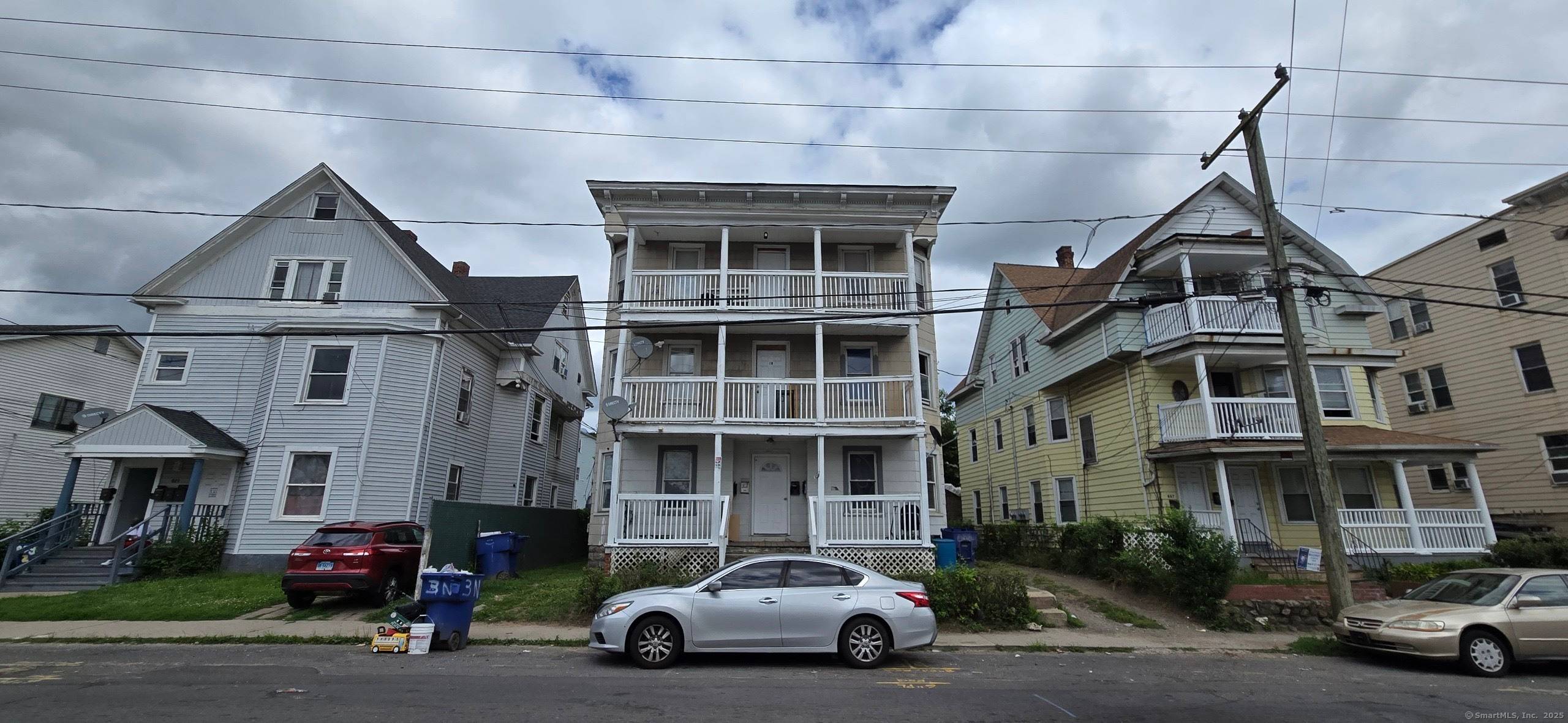 Explore this fully occupied 6 family opportunity for under 600, 000 !