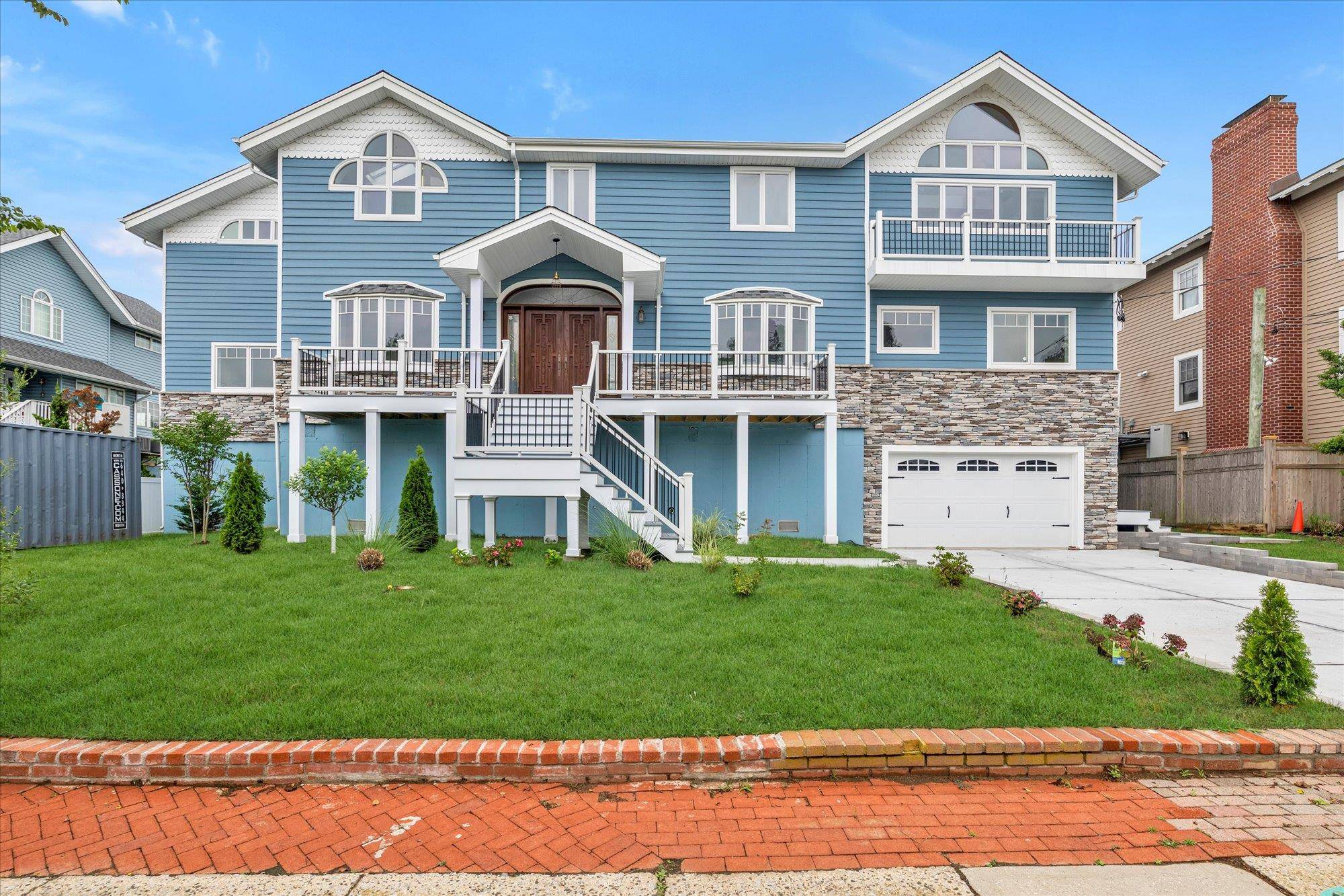 Welcome to 744 South Long Beach Avenue an exceptional 5, 762 sq ft waterfront residence offering the perfect blend of luxury, functionality, and unforgettable sunset views over Randle Bay.