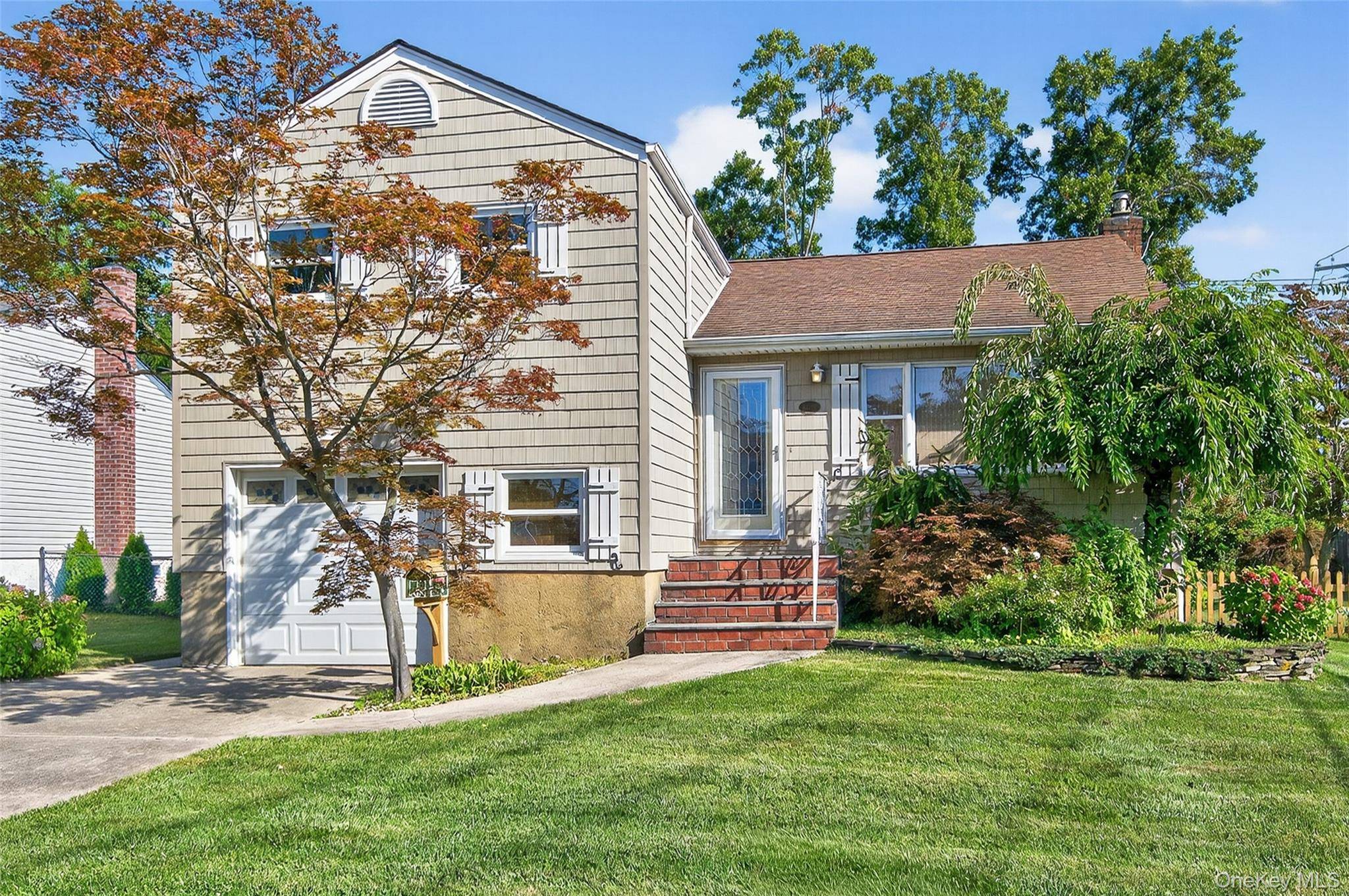 Welcome to this spacious split level home featuring three bedrooms and one full bath.