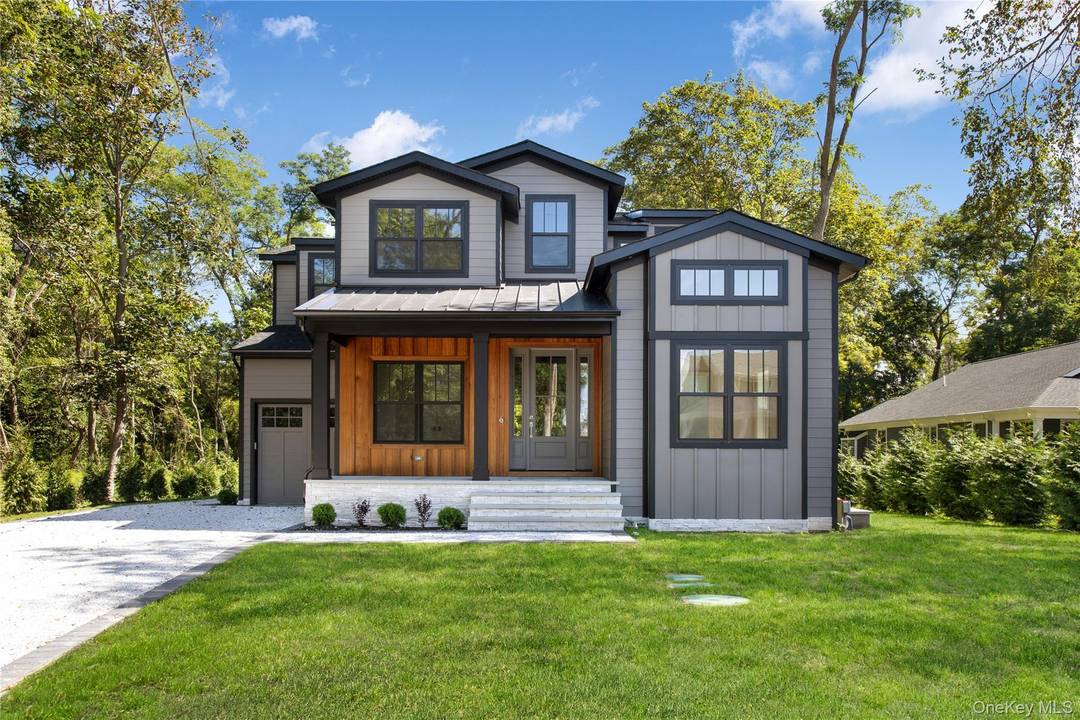 This beautiful Newly Constructed Modern Craftsman Cottage style home, tucked away down a private lane, boasting 3245 sq' interior living space, black onyx saltwater pool and serene wooded property while ...