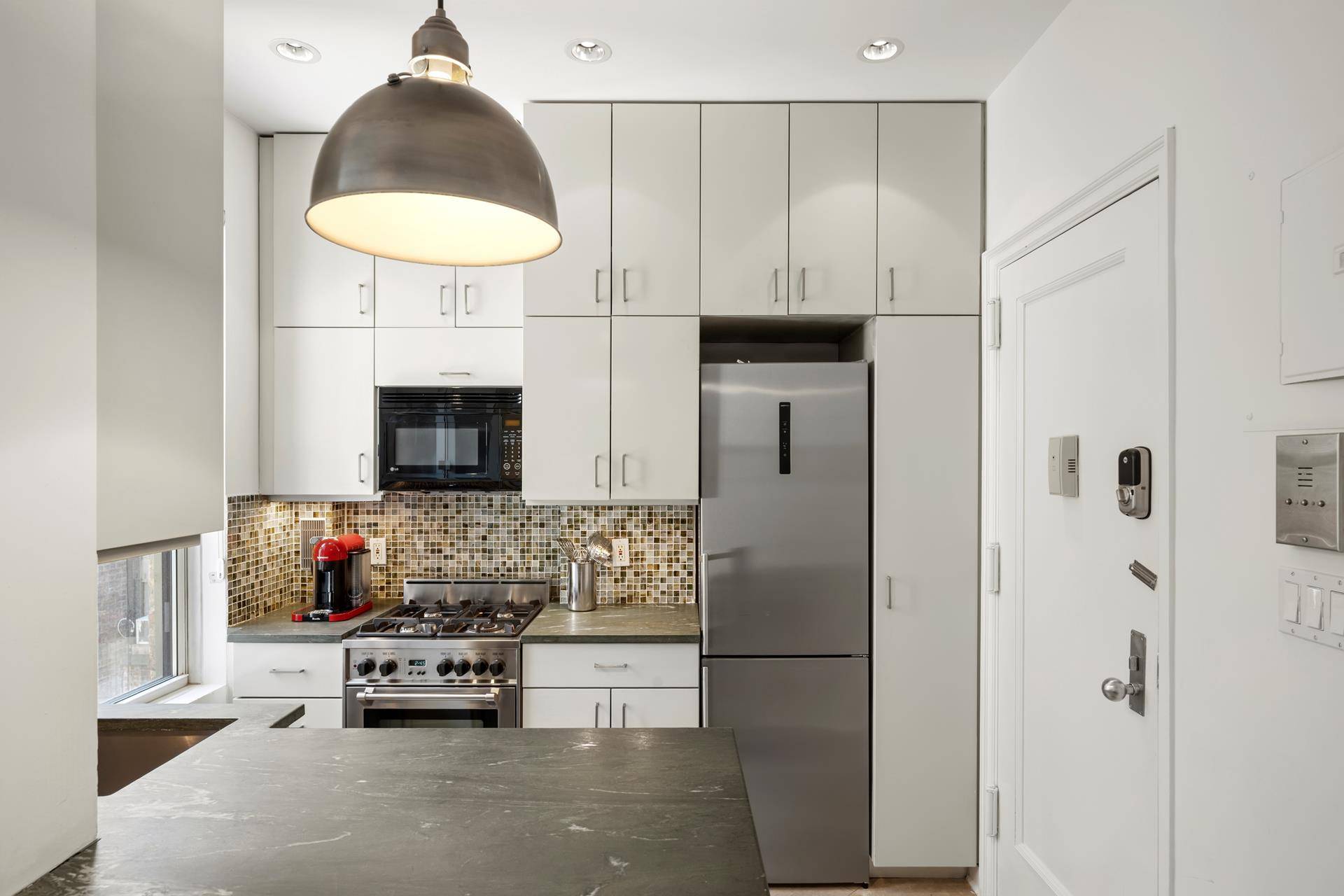 Spacious and stylish, this oversized one bedroom in a well maintained elevator building combines classic charm with modern convenience.