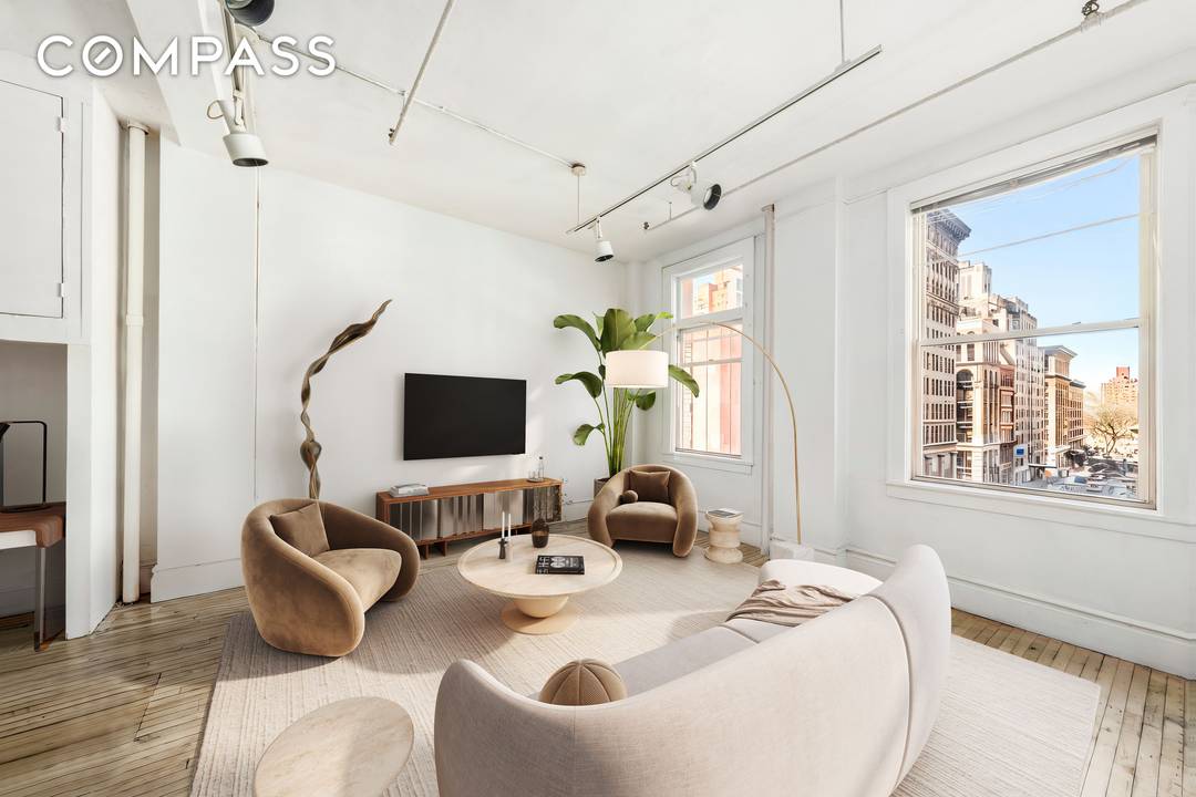 Welcome to Residence 4A at 718 Broadway, a quintessential Manhattan loft where soaring proportions meet extraordinary architectural possibility.