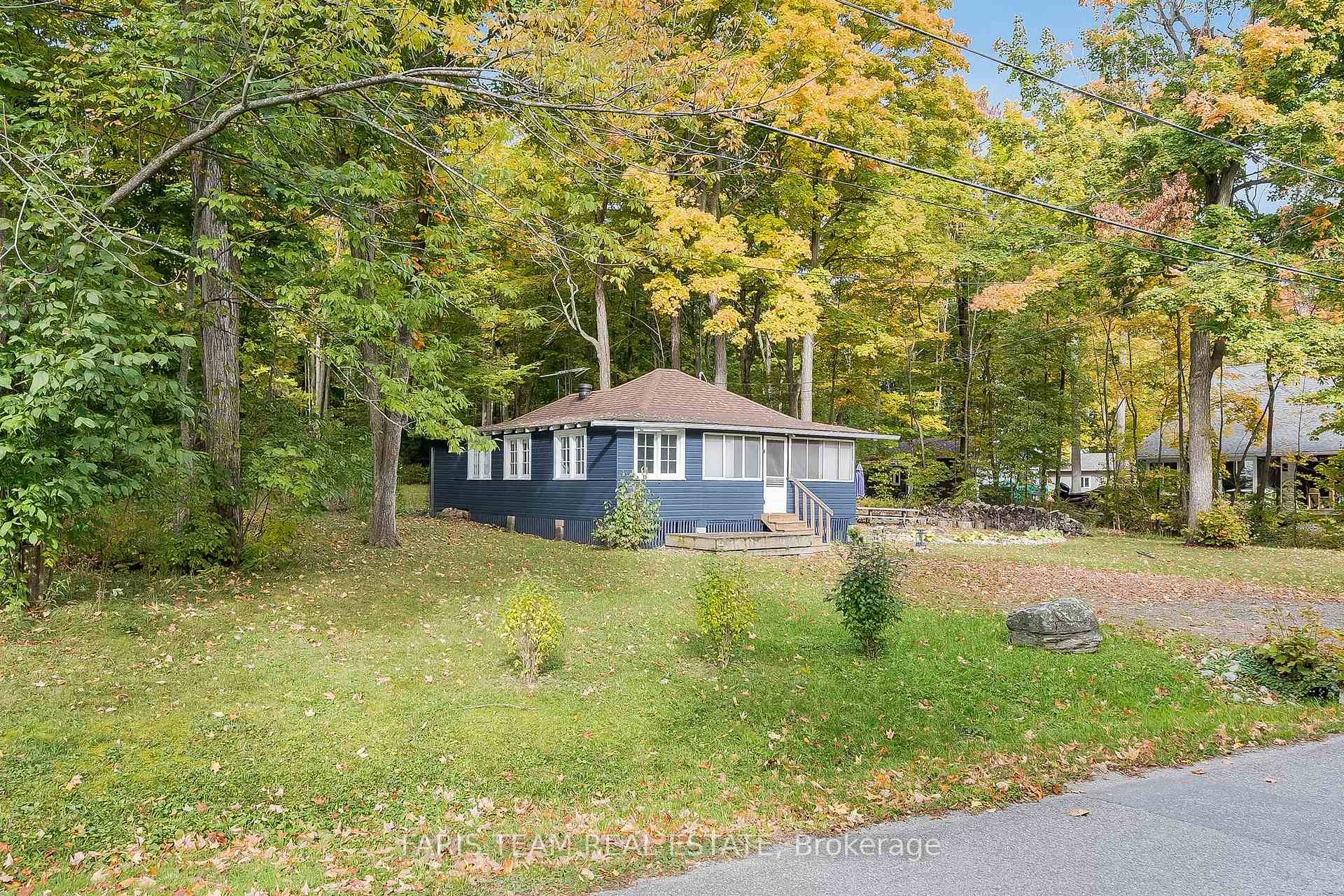 Top 5 Reasons You'll Love This Home 1 Incredible location with unobstructed water views and direct access just steps away, perfectly positioned for your future dream build in a peaceful, ...