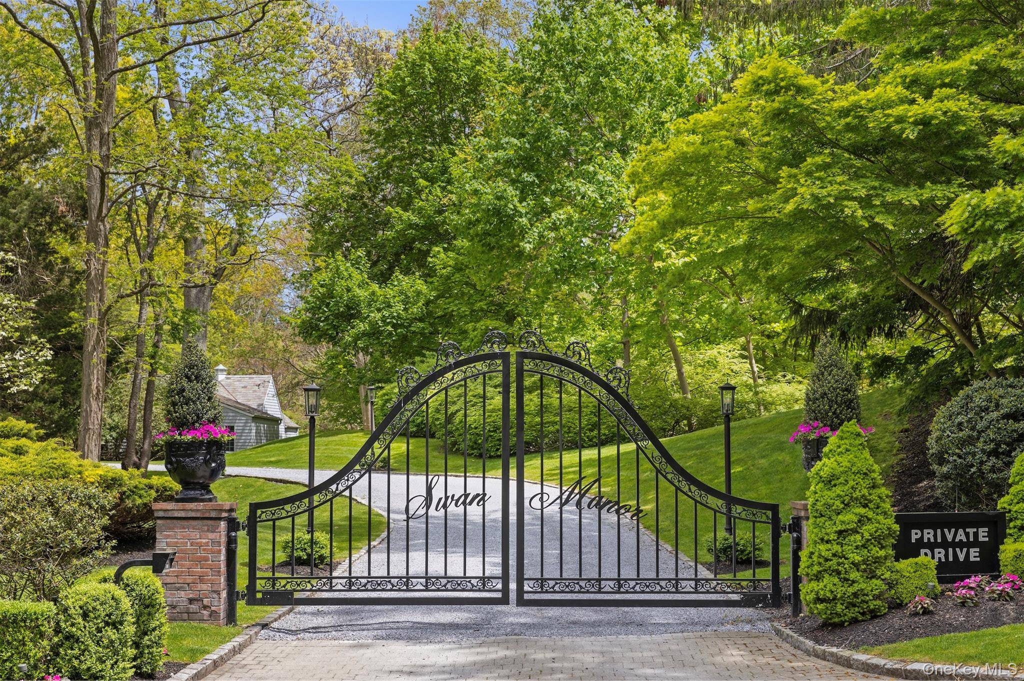Set on 9 pristine acres with panoramic views of Long Island Sound, this private, gated estate is a masterpiece of history and modern refinement.