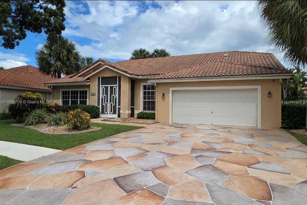 Discover this well maintained, spacious with tall ceilings, natural light residence in the heart of Lauderhill 4 bedrooms den and 2.